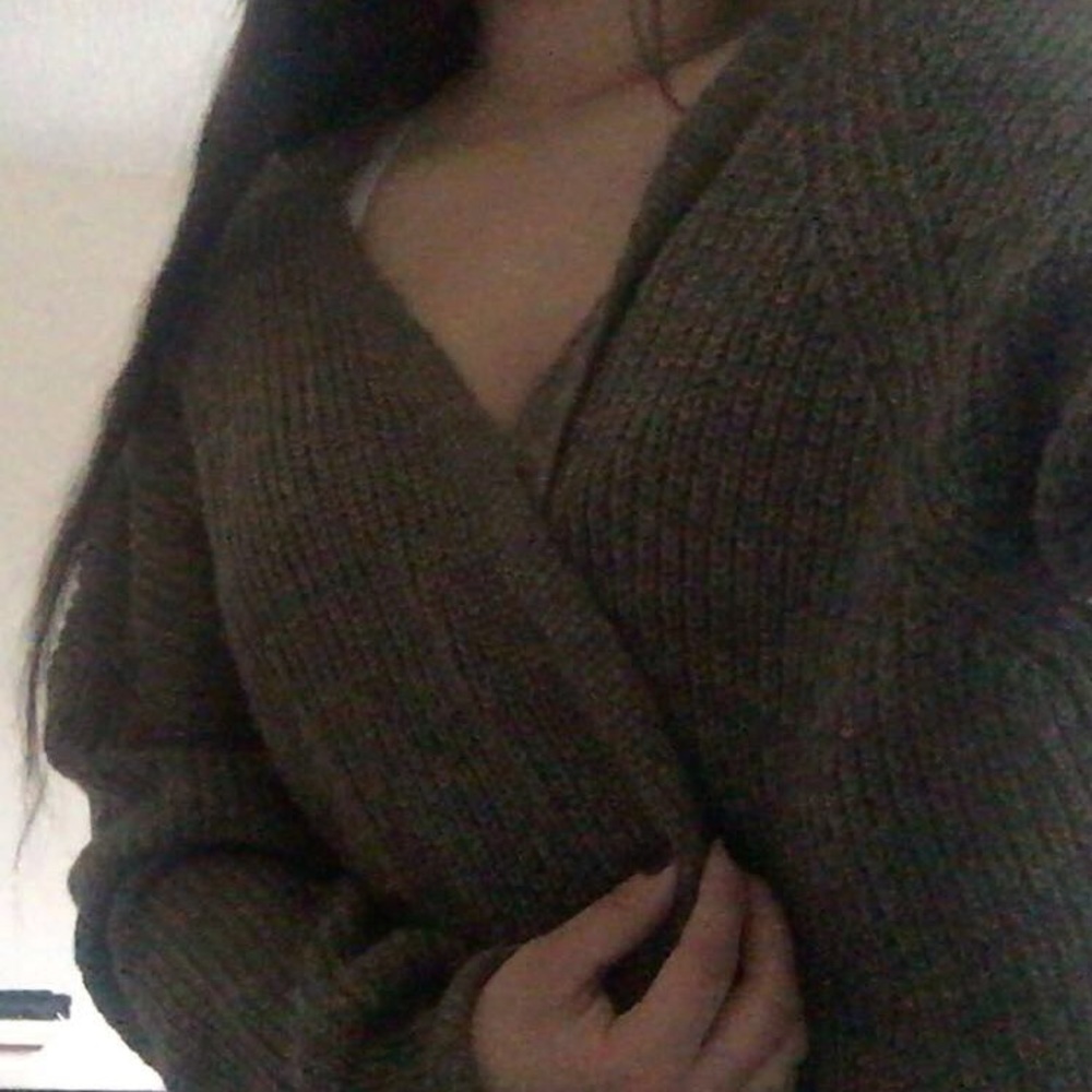green knitted cardigan